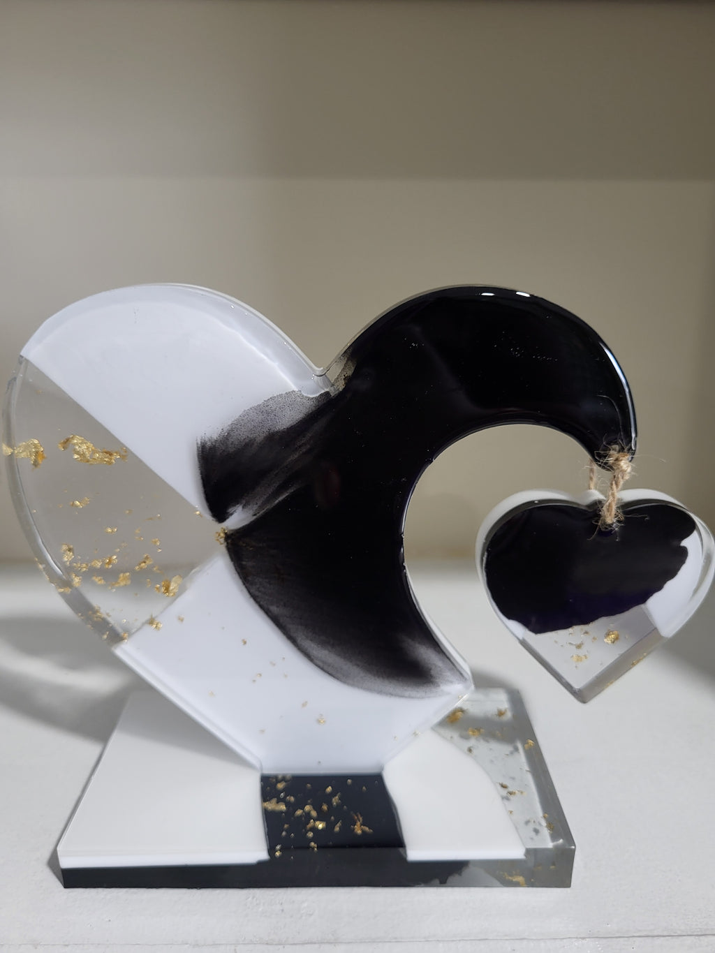 My dangling heart: Black and white with gold flakes