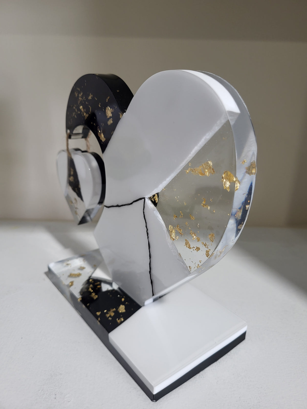 My dangling heart: Black and white with gold flakes
